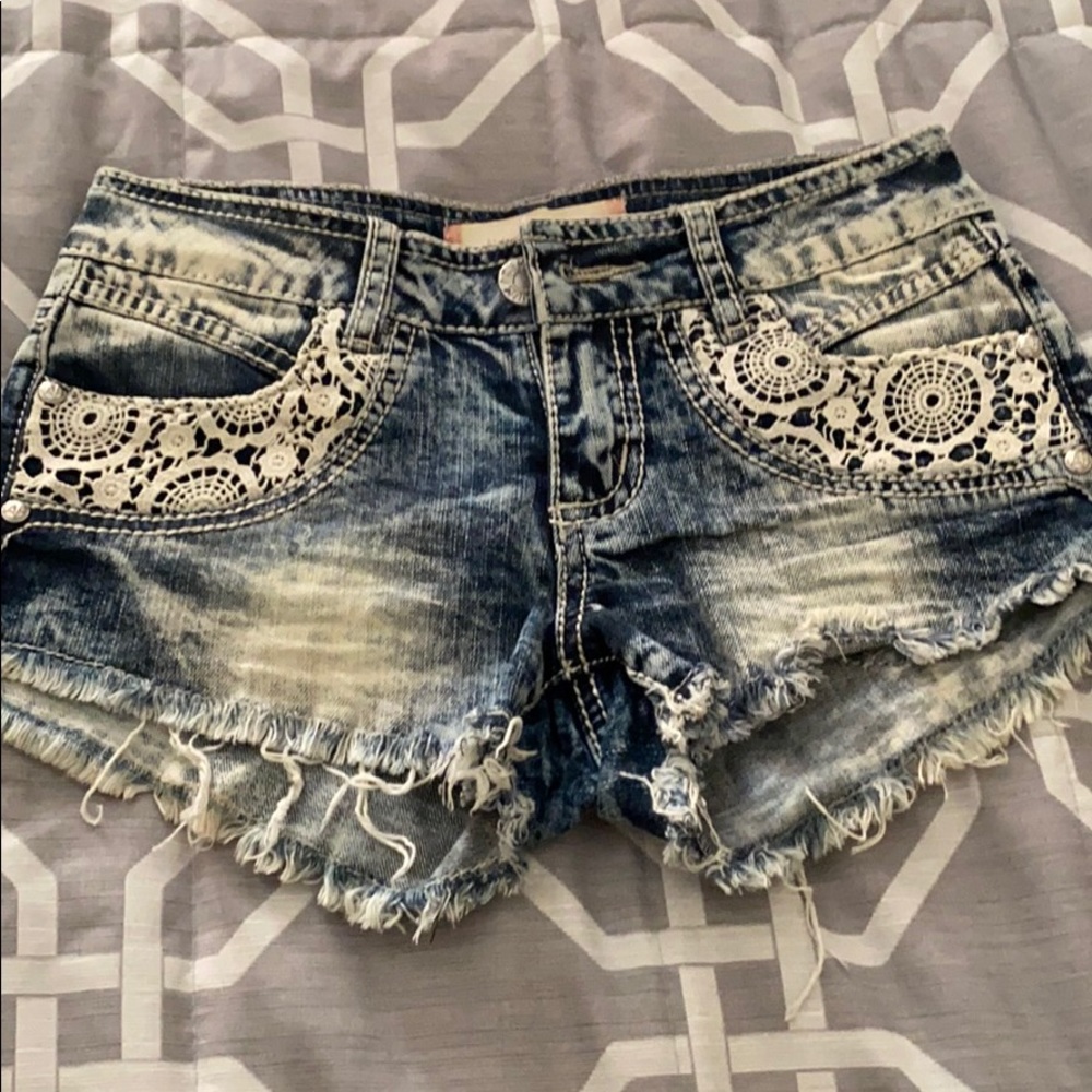 Distressed jean shorts